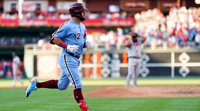 Philadelphia Phillies’ Kyle Schwarber, left, rounds the bases after hitting a three-run home run against Atlanta Braves pitcher Jesus Cruz during the fourth inning of a baseball game, Thursday, June 30, 2022, in Philadelphia.